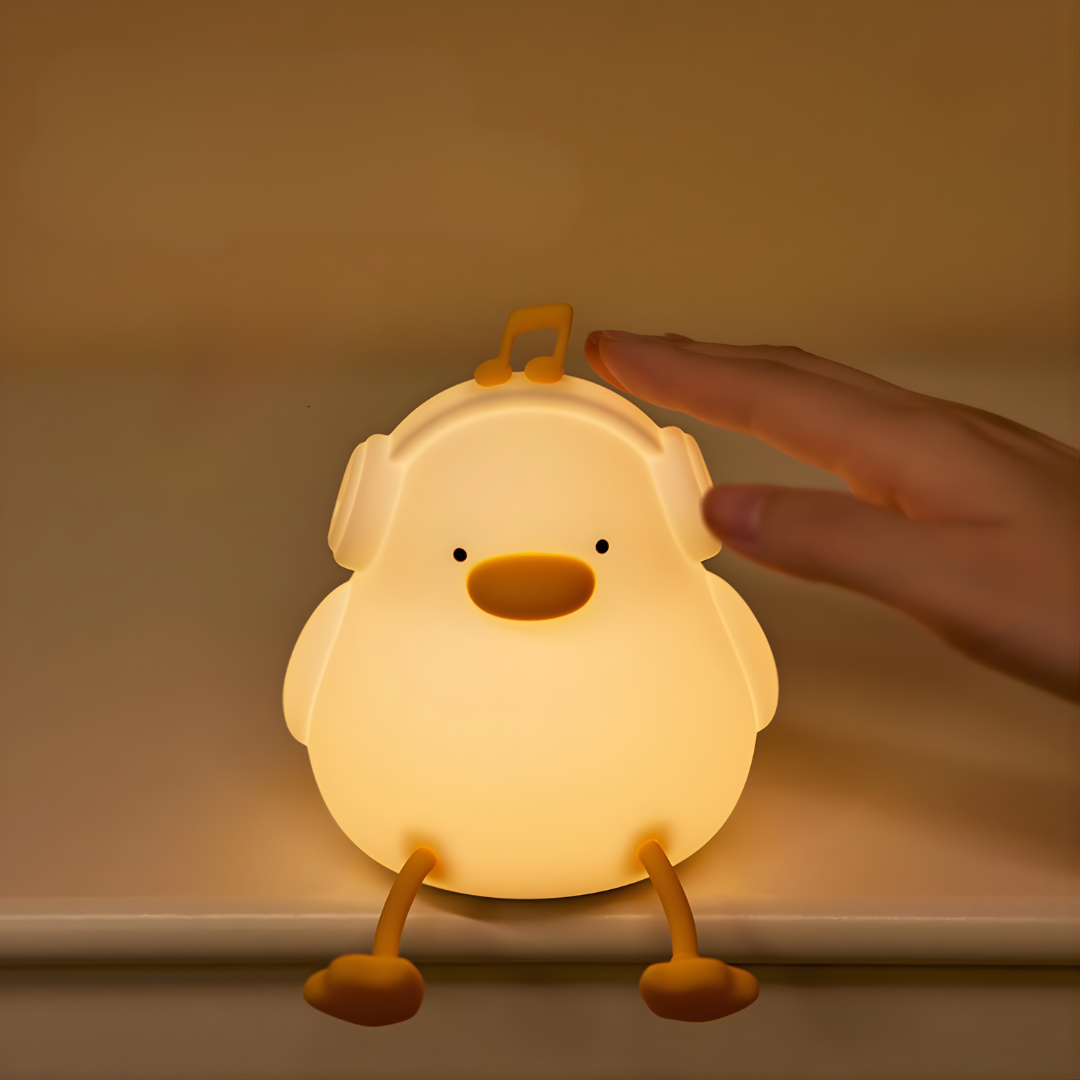 Luz nocturna para niños pequeña y portátil con diseño de pato adorable